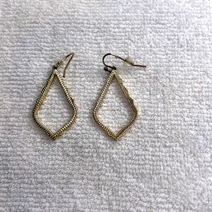 Signature Kendra Scott drop earrings.